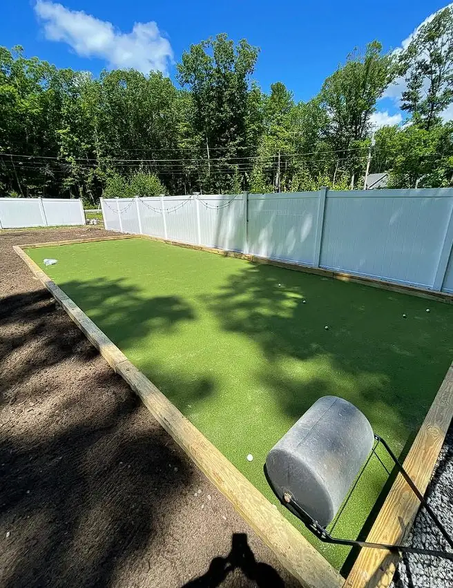 Artificial turf bocce court installation by Billy Goat Landscaping