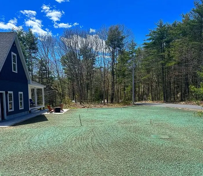 Hydroseeded lawn establishment at a Maine farmhouse property