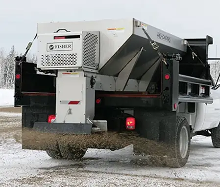 Sand and salt spreader truck used for ice management by Billy Goat Landscaping